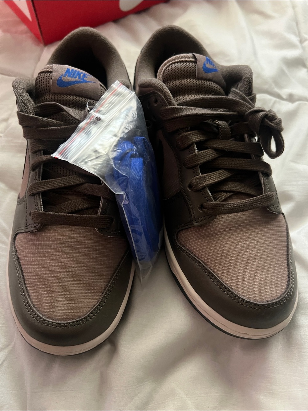 Nike Men’s Brown Low-Top Sneakers with Blue Accents